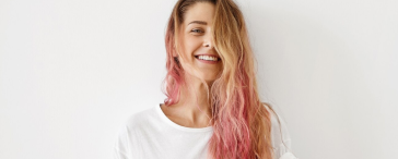 Woman with soft pink balayage