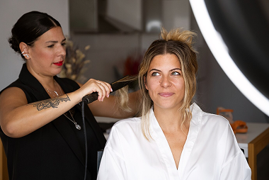 Woman getting her hair braided