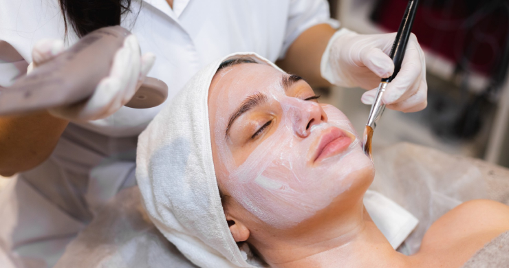 Woman enjoying a professional facial in Balagere, Bangalore