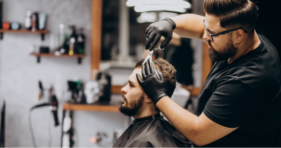 Professional stylist giving a modern haircuts for men in Mahadevapura, Bangalore