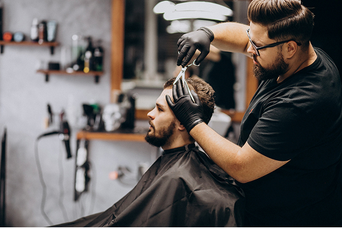 Professional stylist giving a modern haircuts for men in Mahadevapura, Bangalore