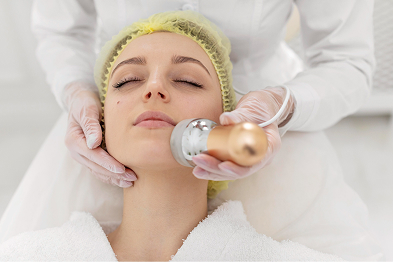 Beautician performing relaxing facial in Whitefield, Bangalore for glowing skin