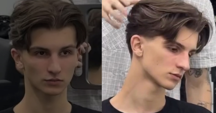 Man checking mirror after stylish haircut for men in Indiranagar